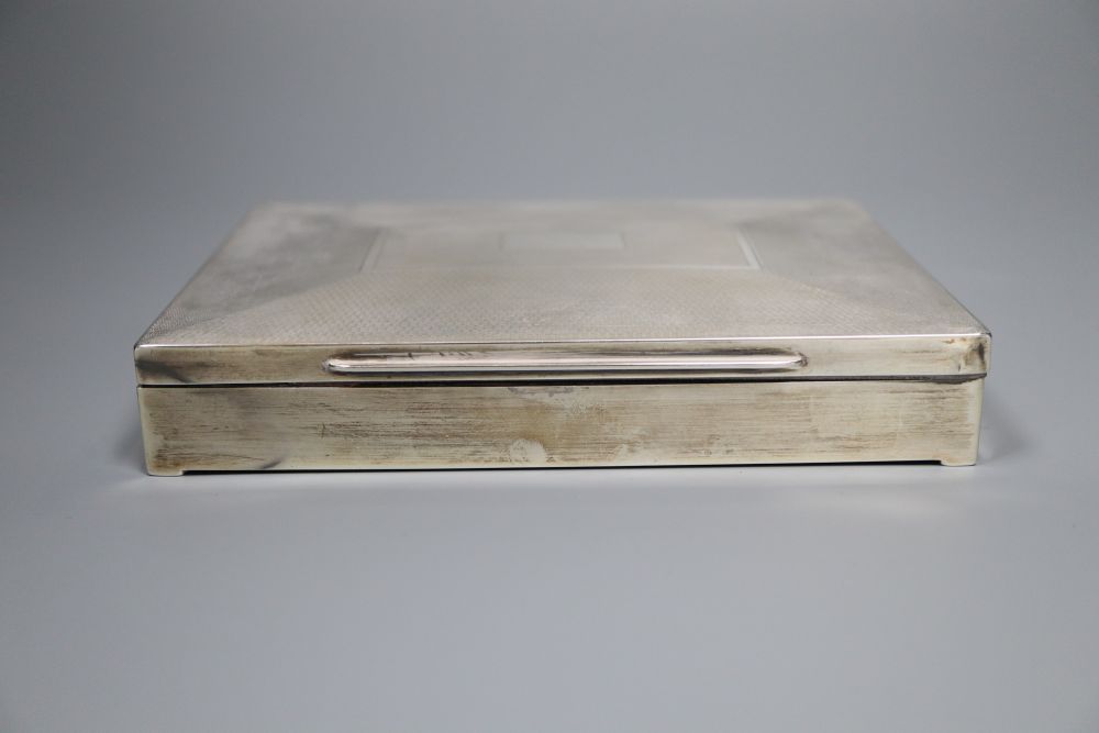 A George V part engine turned silver mounted rectangular cigarette box, William Adams Ltd, Birmingham, 1933, 16.1cm,